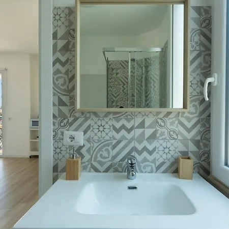 Апартаменты Cozy By The Sea